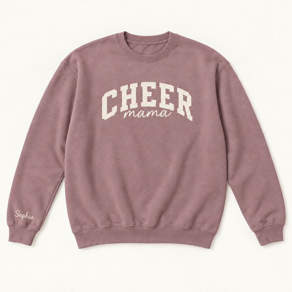 Pink Cheer Mama sweater with Sophia in clean script above the cuff