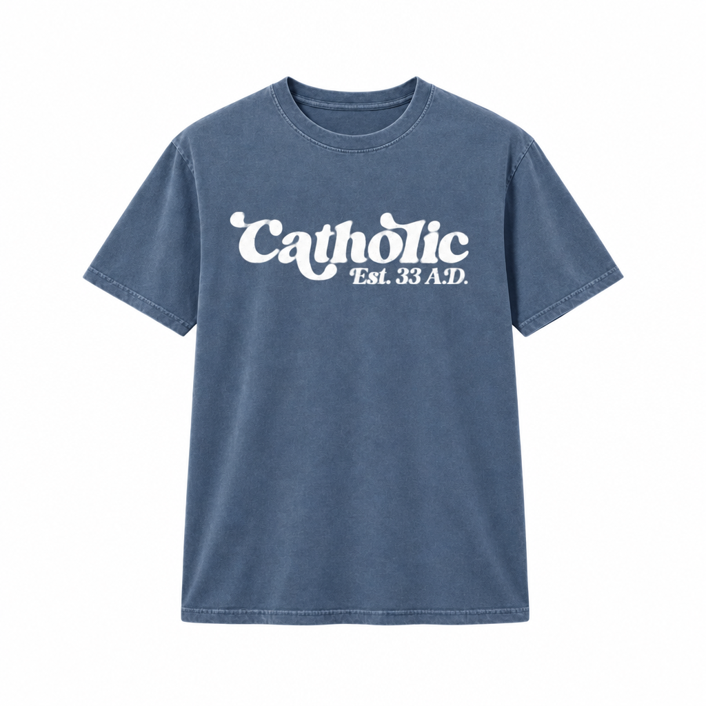White Catholic retro design on a blue denim-colored shirt